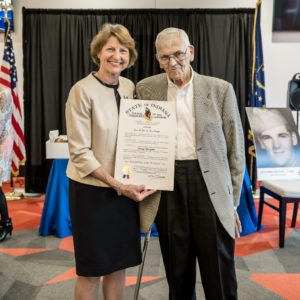 Rotarian Elaine Bedel, Secretary & CEO of the Indiana Destination Development Corporation, with George Dingledy; Bedel presented the Sagamore of the Wabash on behalf of Gov. Eric Holcomb.